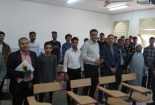 تبریک روز استاد در دانشگاه آزاد اسلامی واحد بافق با تقدیم گل به اساتید